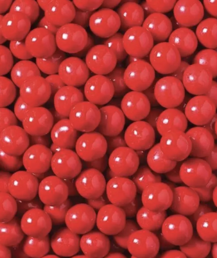 Chocolate Jaffas ( Per 100g )